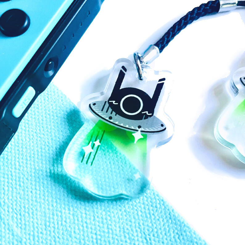 Phone charms inspired by quiet pride